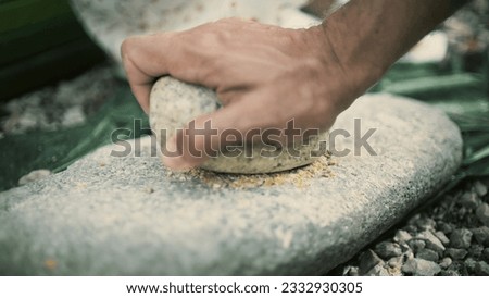 Making bread flour in a primitive historic way