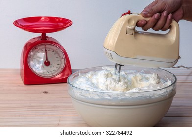 Making Butter  Cream Cake Using Hand Mixer