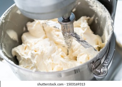 Making buttercream frosting for decorating a vanilla cake. - Shutterstock ID 1503169313