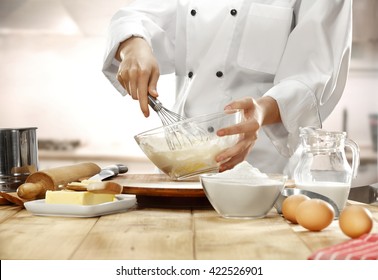 making cake in kitchen 