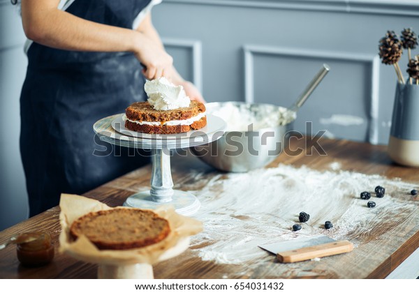 making cake in\
kitchen