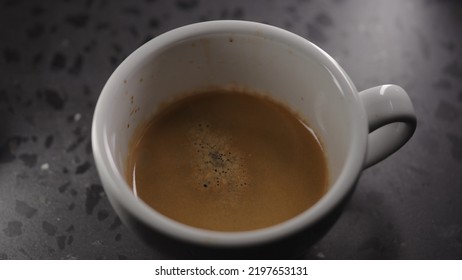 Making Cappuccino, Pour Steamed Milk Into White Cup With Espresso