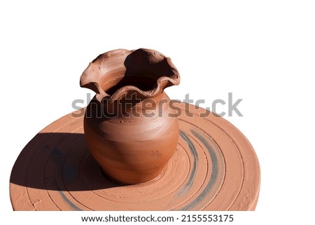Making ceramic pot.Pottery workshop outside. Clay pottery textured background.