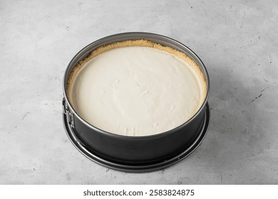 Making the cheesecake, bake before putting it in the oven