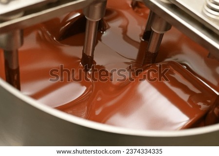 Making chocolate, conching chocolate mixture