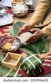 Making Chung cake by hands closeup, Chung cake is the most important traditional Vietnamese lunar New Year (Tet) food.