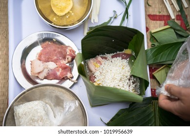 Making Chung cake by hands closeup, Chung cake is the most important traditional Vietnamese lunar New Year (Tet) food.