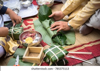 Making Chung cake by hands closeup, Chung cake is the most important traditional Vietnamese lunar New Year (Tet) food.