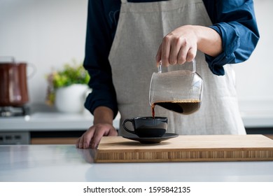 Making coffee in the kitchen
