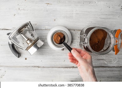 Making coffee set on the white wooden table top view