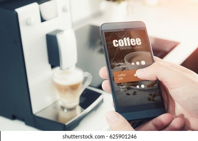 Making coffee from smartphone, modern coffee maker. coffee machine wireless prepare internet smartphone technology application concept - Powered by Shutterstock