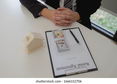 Making a contract to buy housing Making a home loan Financial planning for the purchase of housing. - Shutterstock ID 1666152706