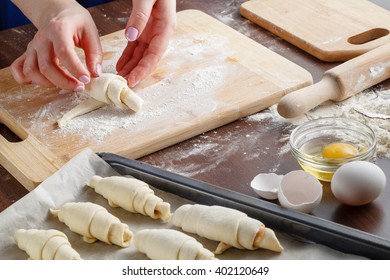 Making croissant on wood table - Shutterstock ID 402120649