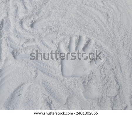 Making dough by female hands on white wooden table background. Female baker preparing bread dough at white table.