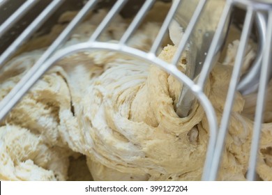 Making dough by machine spinning - Powered by Shutterstock