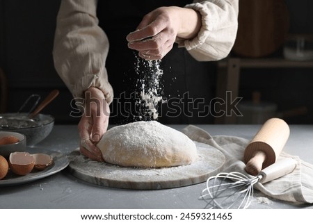 Similar – woman kneading bread dough with her hands