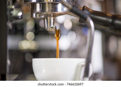 Making a espresso and cappuccino - Shutterstock ID 746610697