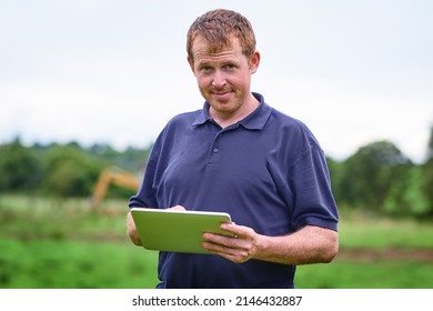 Making Farming Easier With Modern Tech. Shot Of A Farmer Using A Digital Tablet On His Farm.