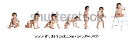 Little cute baby and his mother enjoying shiny lights and ornaments on the Christmas tree