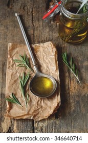 Making Fragrant Rosemary Oil With Olive Oil And Fresh Herbs