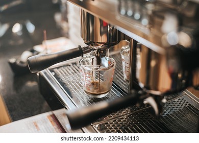 Making Fresh Coffee From Espresso Machine. Preparing Hot Espresso Coffee By Automatic Coffee Machine In Counter Coffee Shop.