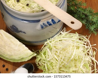 Making Fresh Sauerkraut On Wooden Background