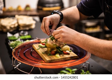 Making Fresh, Tuna Salad In Hot Potato With Tomato, Eggs And Herbs On Wooden Cutting Board