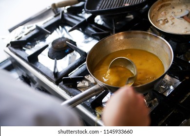 Making Gravy On The Restaurant Stove