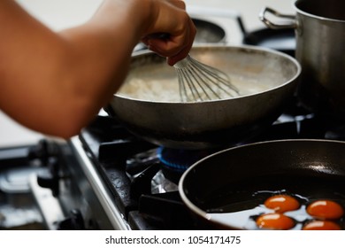 Making Gravy And Whisking