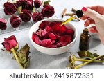 Making homemade rose potpourri by drying roses petals and adding essential oils spices, DIY