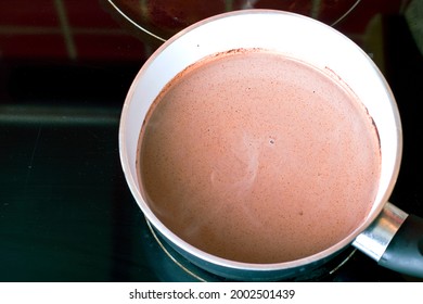 Making Hot Chocolate On Milk In A Pot