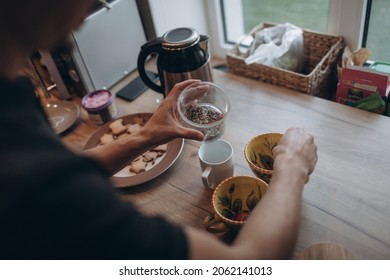 Making Hot Tea With Cookies And Apple Pie 