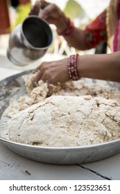 Making Indian Naan Bread Dough On Wooden White Table