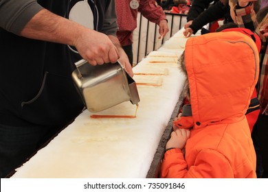 Making A Maple Syrup Candy On The Snow.  Maple Syrup Festival. 