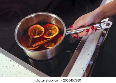 Making Mulled Wine At Home On The Hob. 