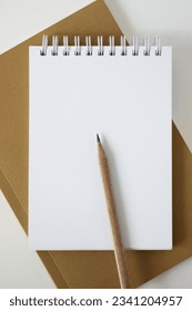 Making Notes. Blank Sheet of Spiral Notebook with Pencil. 
