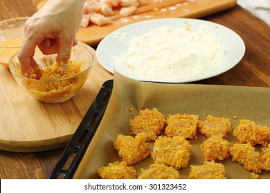 Making oven baked corn flake crumbs chicken nuggets. Series.