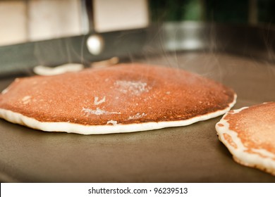 Making pancakes on an oven griddle