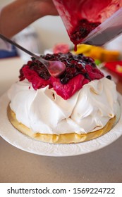 Making Pavlova Cake With Fruit Cream