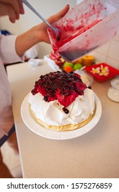 Making Pavlova Cake With Fruit Cream