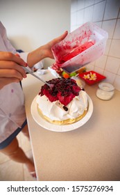 Making Pavlova Cake With Fruit Cream