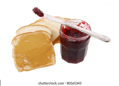 Making Peanut Butter And Strawberry Jelly Sandwiches