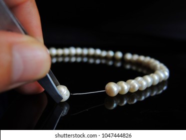 Making a pearl necklace