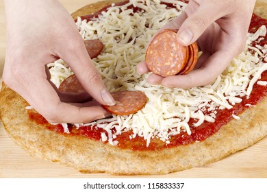 Making A Pepperoni Pizza Using A Human Hand