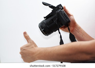 Making photos abstraction. Camera isolated on white background.