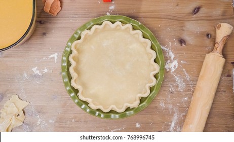 Making Pie Crust From Scratch To Bake Pumpkin Pie.