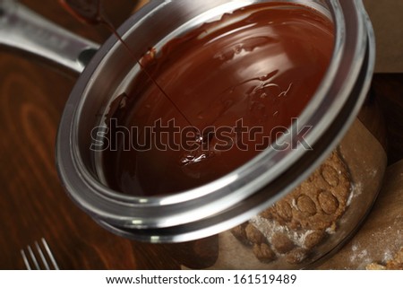 Making Praline (Chocolate Candy with Nut Filling)