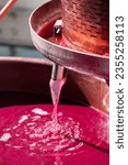 making of red wine  by winepress