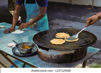 Making Of Roti Canai Or Roti Prata Famous Indian Margarine Flatbread In Malaysia. Go Travel Brunei, Thailand, Indonesia, Singapore Muslim Food 