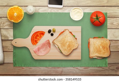 Making Sandwich On Cutting Board At Breakfast Time Top View.